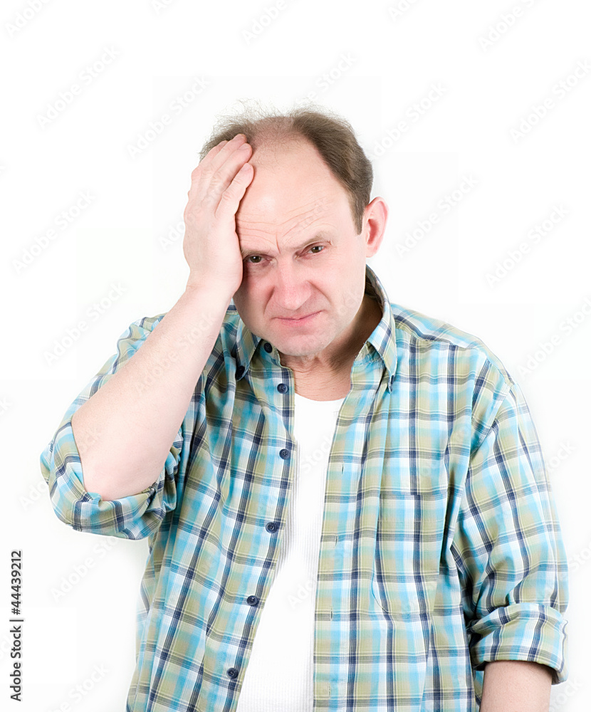 Portrait of old man having a headache
