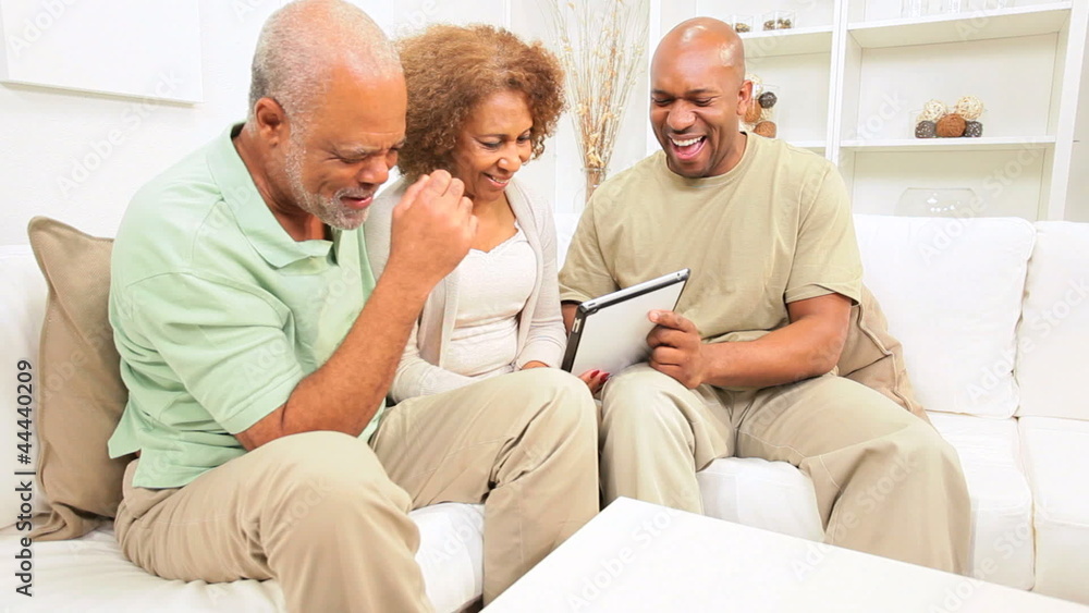 Ethnic Son and Elderly Parents Using Wireless Tablet Ethnic Son and Elderly Parents Using Wireless Tablet