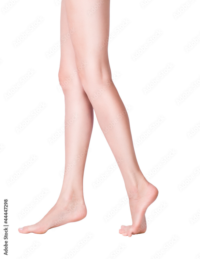 Long pretty woman legs isolated on white Long pretty woman legs isolated on white