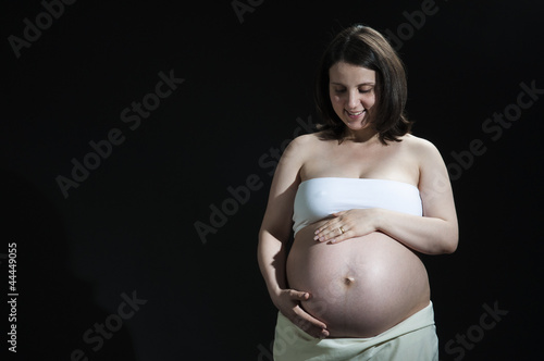 Happy young pregnant woman