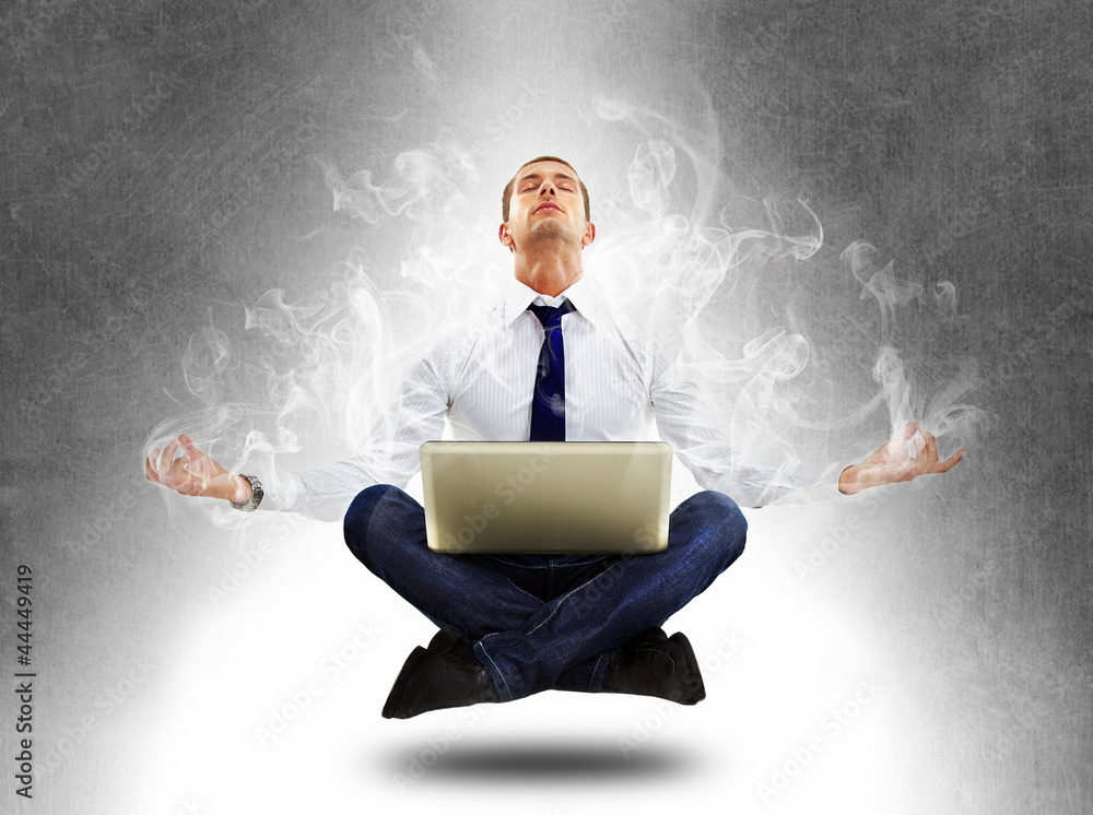 yoga businessman in total concentration with laptop yoga businessman in total concentration with laptop