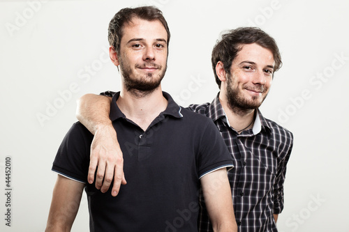 Two Happy Twins Hugging