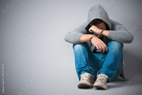 Slika na platnu Arrested teenager with handcuffs on his hands