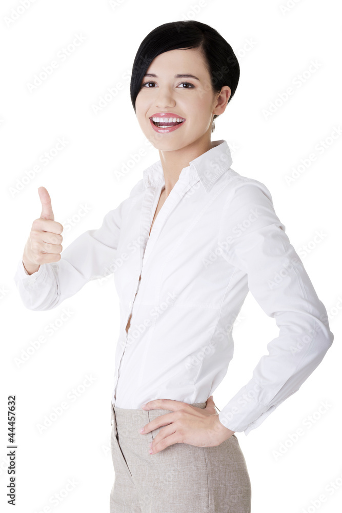 Happy smiling business woman with thumbs up gesture Happy smiling business woman with thumbs up gesture