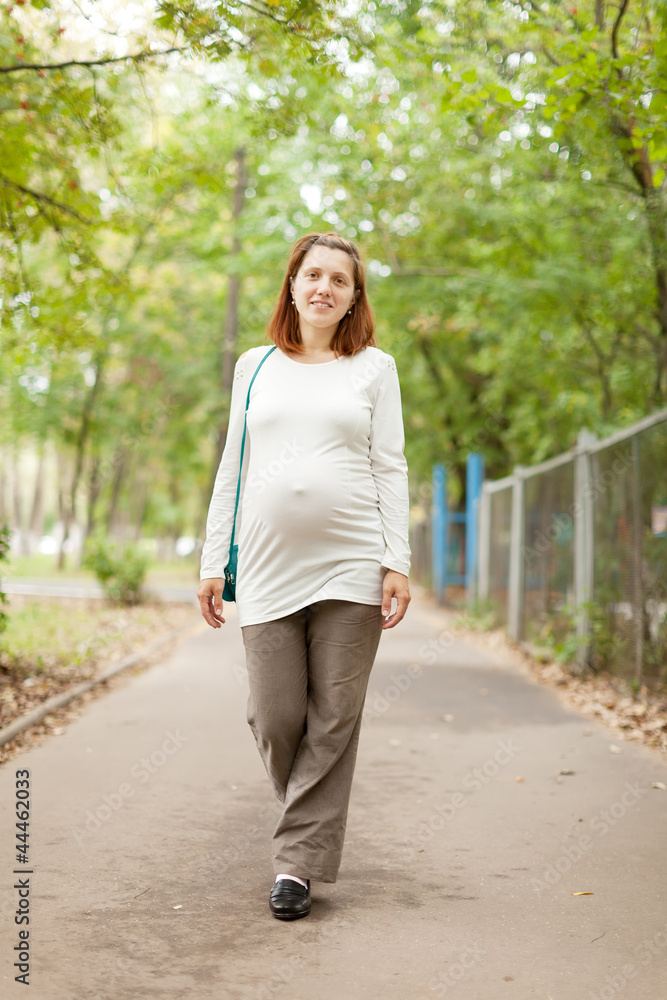 Full length of pregnant woman