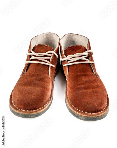 a pair of brown suede shoes