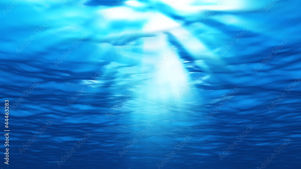 Underwater scene with shadows passing by and lightrays going thr Underwater scene with shadows passing by and lightrays going thr