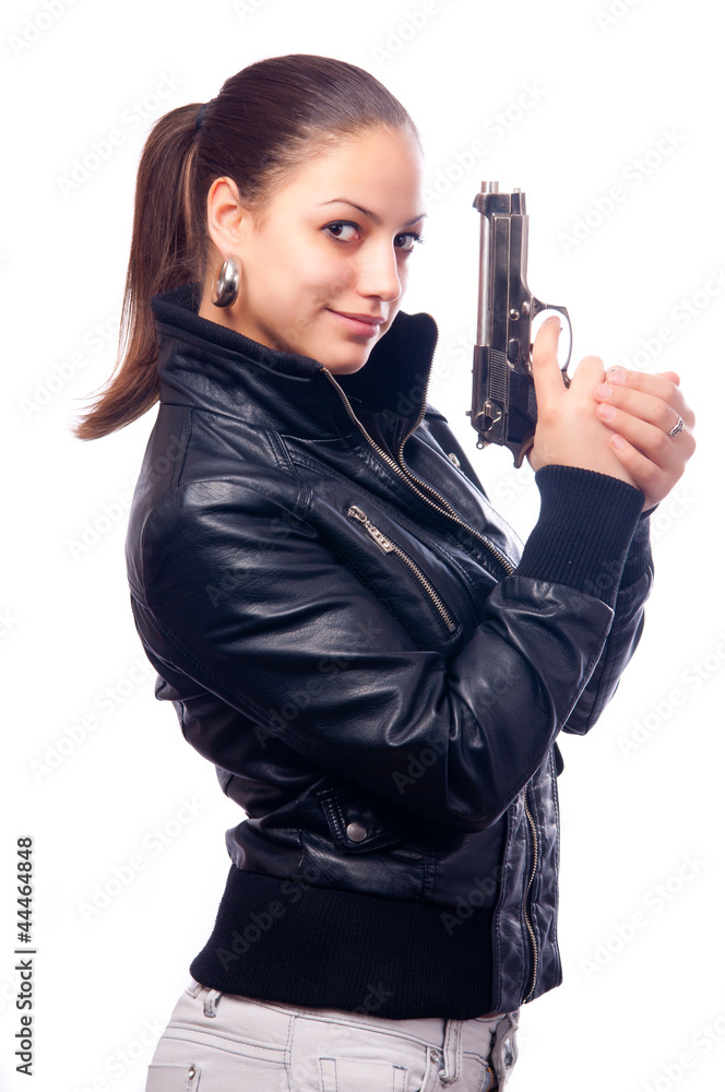 Beautiful girl in black leather jacket and beretta gun Beautiful girl in black leather jacket and beretta gun