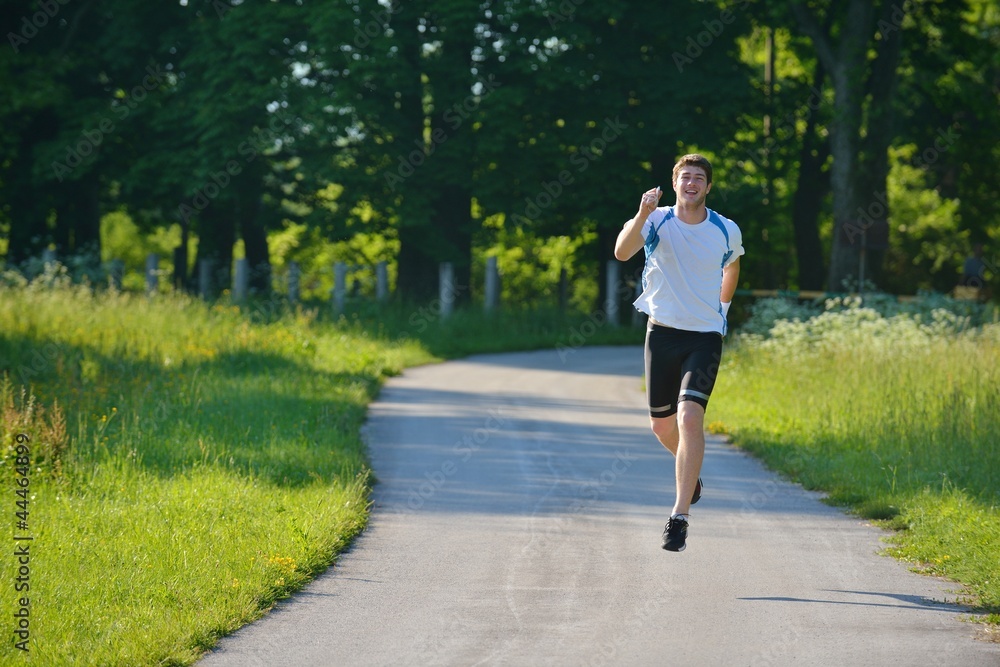 Young beautiful  woman jogging