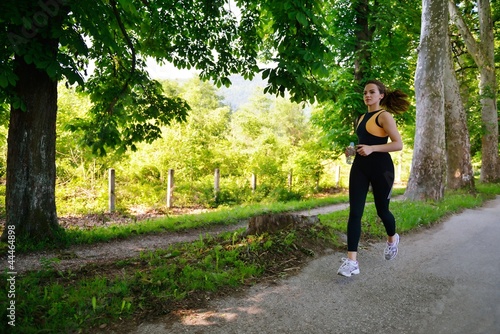 Young beautiful woman jogging