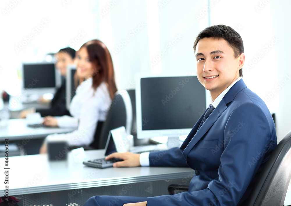 Portrait of a smiling young businessman working Portrait of a smiling young businessman working