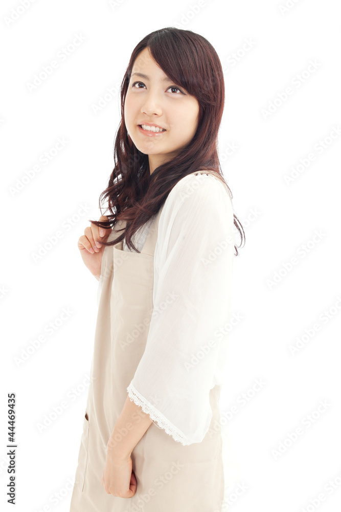 Beautiful young woman wearing an apron. Portrait of asian. Beautiful young woman wearing an apron. Portrait of asian.