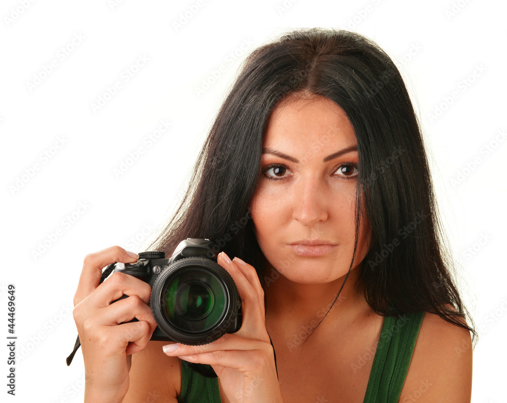 Young woman holding camera isolated on white Young woman holding camera isolated on white