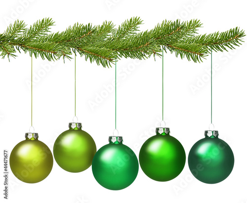Grüne Weihnachtskugeln am Adventszweig