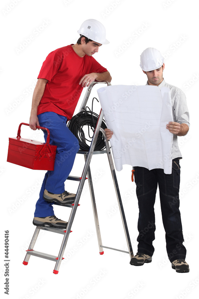 Two handymen working together Two handymen working together