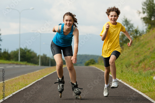 Active young people - rollerblading, running