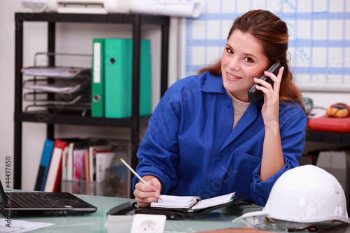 corporate woman answering  phone