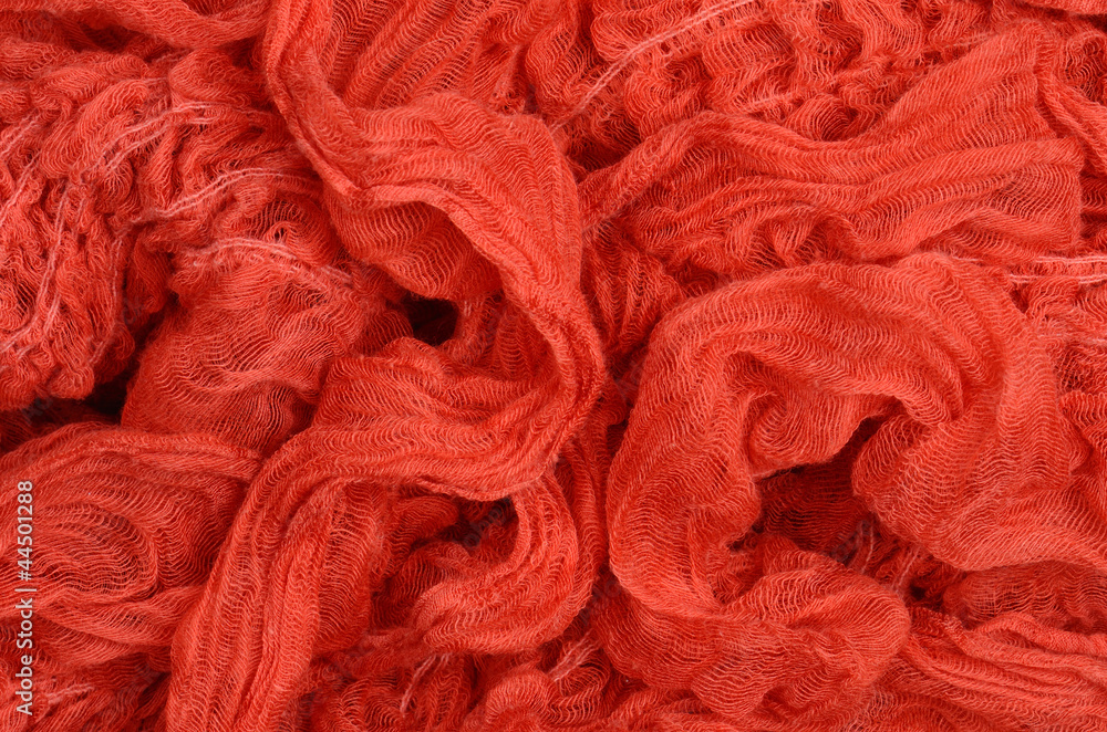 close up red knitted scarf background close up red knitted scarf background
