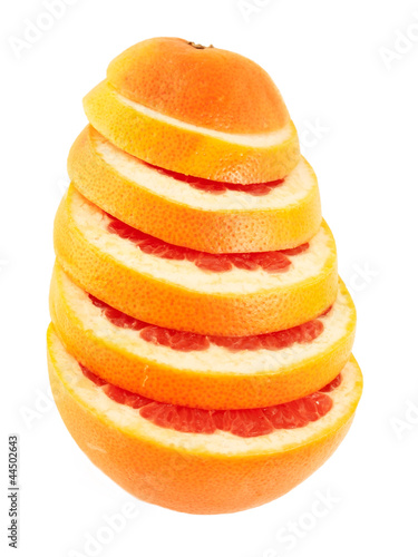 Ripe  grapefruit  slices  isolated on  white