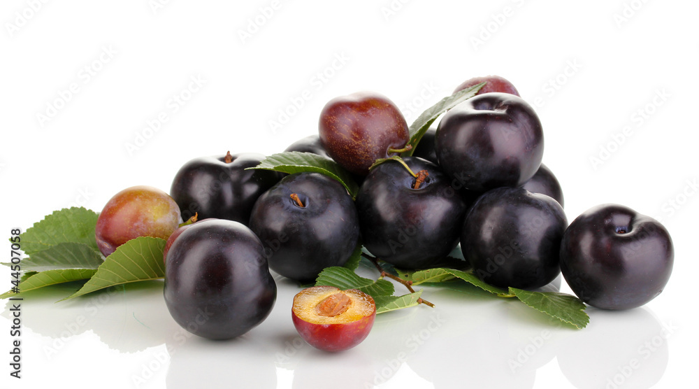 Rip plums isolated on white Rip plums isolated on white