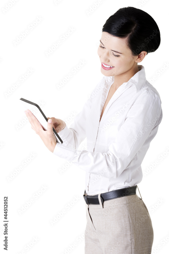 .Business woman holding tablet computer with touchpad. .Business woman holding tablet computer with touchpad.