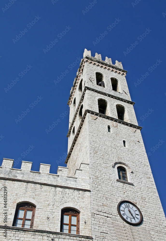 ancient medieval tower with a clock and lace
