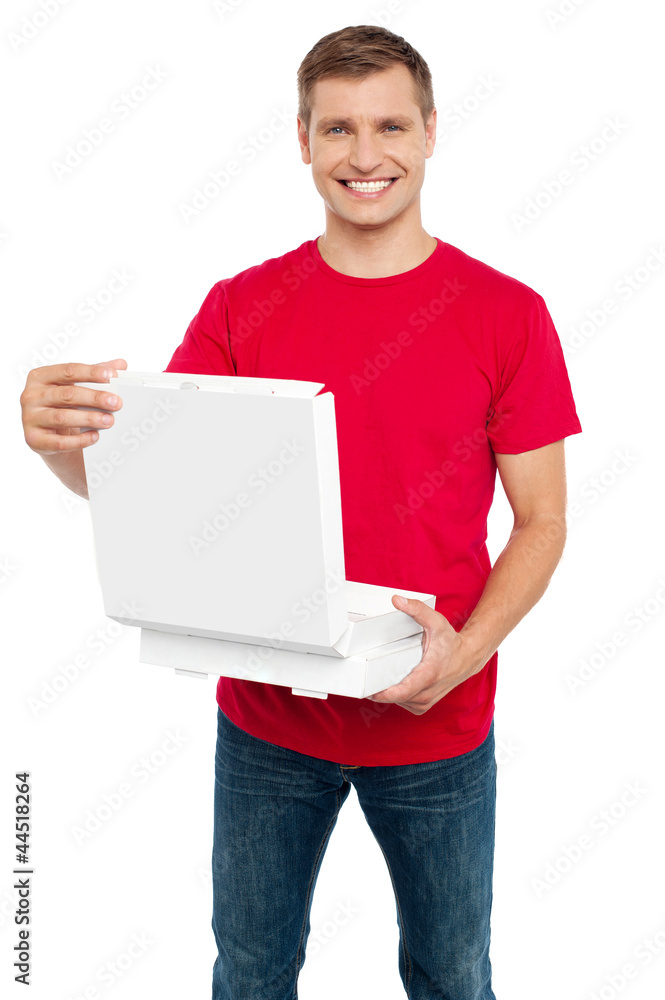 Smiling casual man holding pizza box Smiling casual man holding pizza box