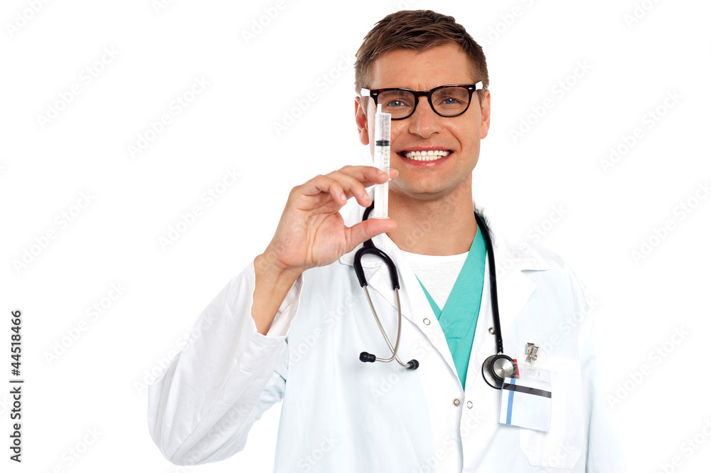 Doctor with an injection needle with white fluid Doctor with an injection needle with white fluid