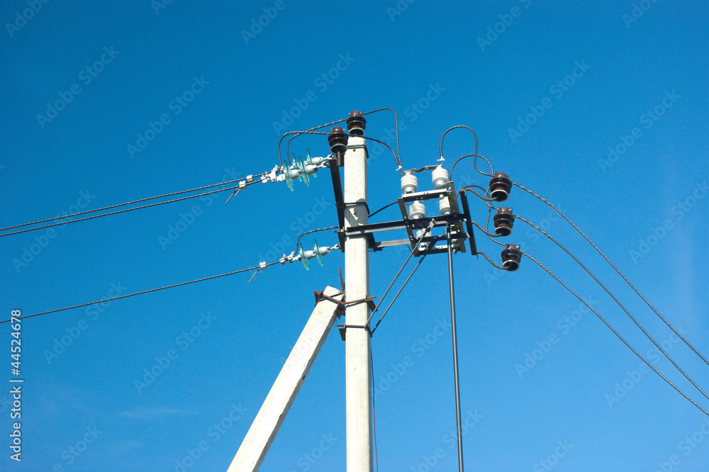 Prop of power supply line over clear cloudless blue sky Prop of power supply line over clear cloudless blue sky