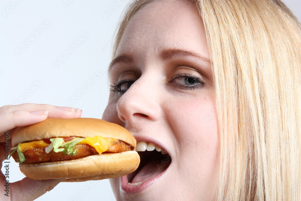 Young woman with vetarian burger Young woman with vetarian burger