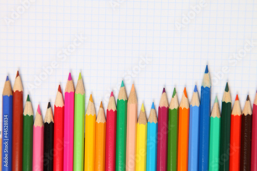 Pencils and checked notebook