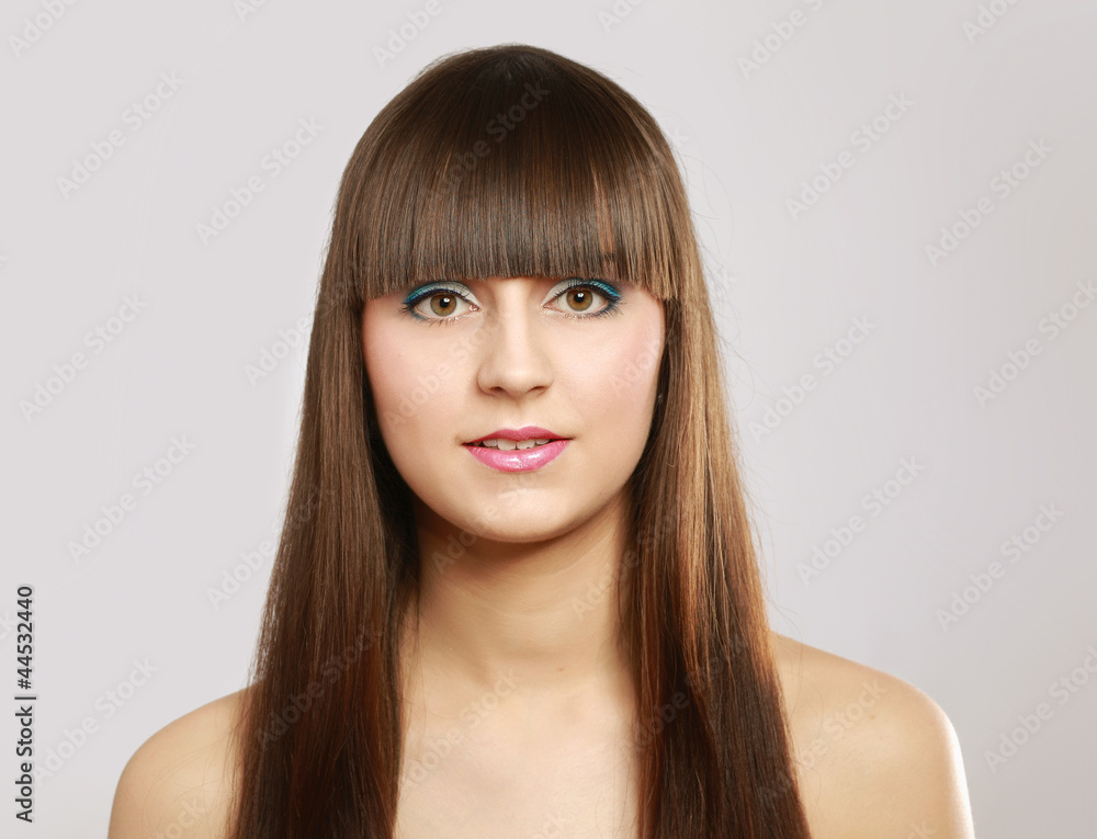Close-up of young female isolated on white background Close-up of young female isolated on white background