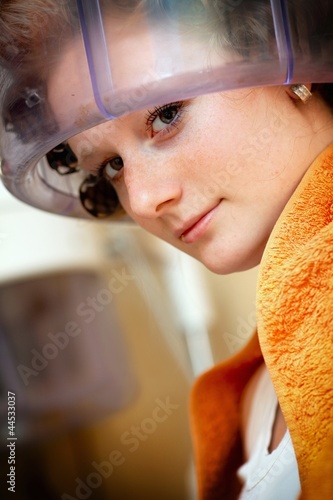 Women  working with hair dryer photo