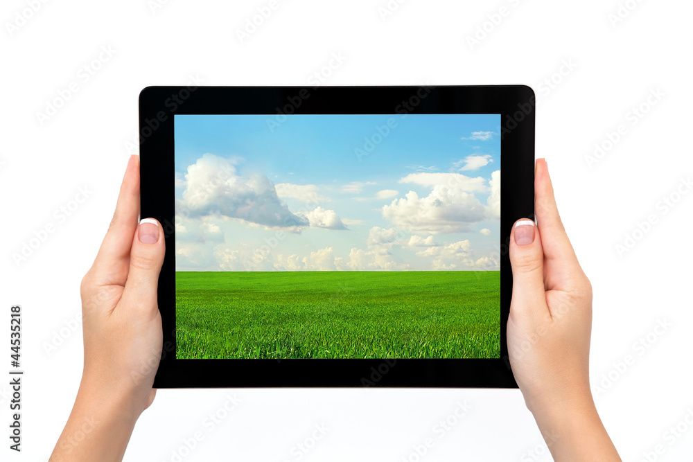 female hands holding a tablet ablet with the image female hands holding a tablet ablet with the image