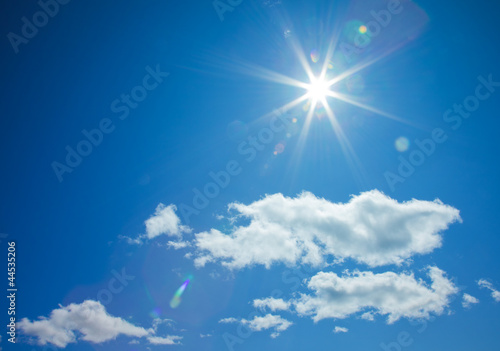 star-shaped sun in blue sky