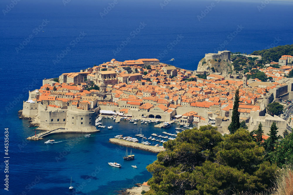 Panoramic view of Dubrovnik city with blue water