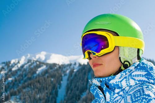 Sport woman in snowy mountains © petunyia