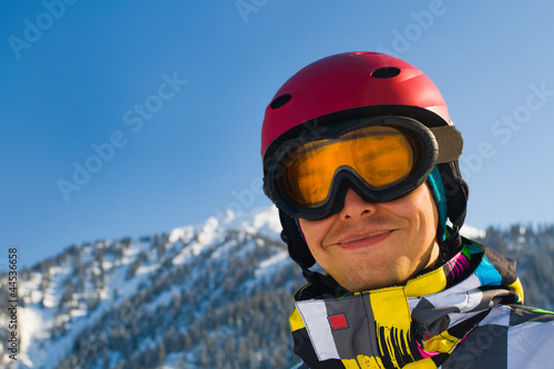 Sport man in snowy mountains