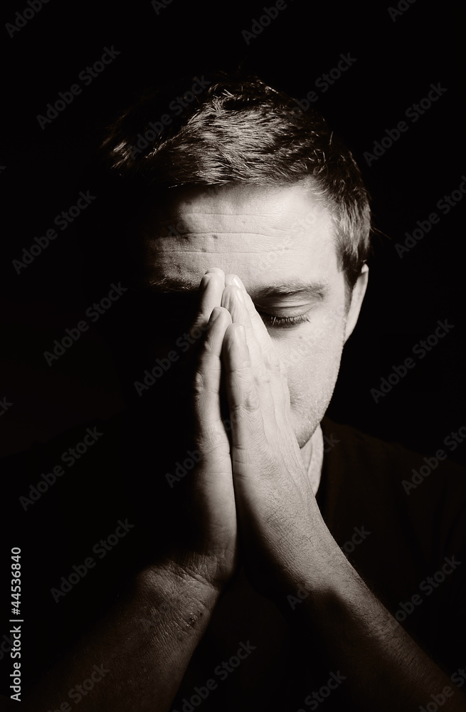 Praying man.