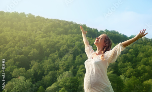 woman enjoying life outdoors in summer