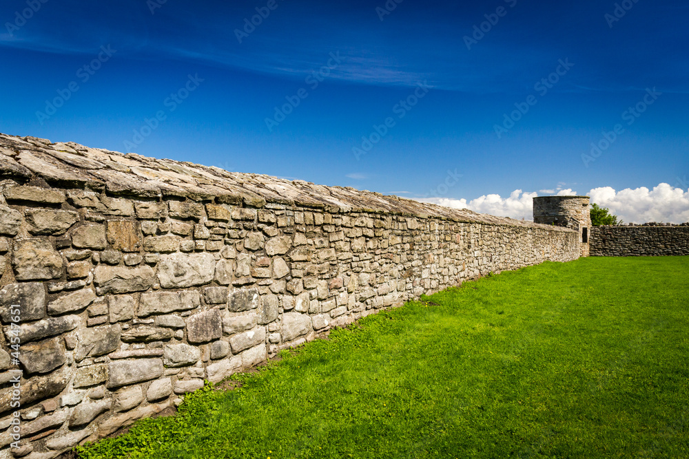 Medieval wall surrounding the castle with stone