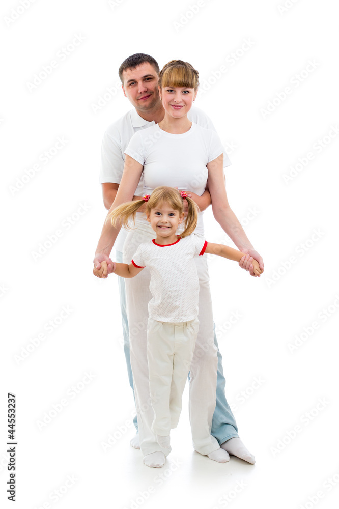 Happy kid girl with parents looking directly to camera. Studio s