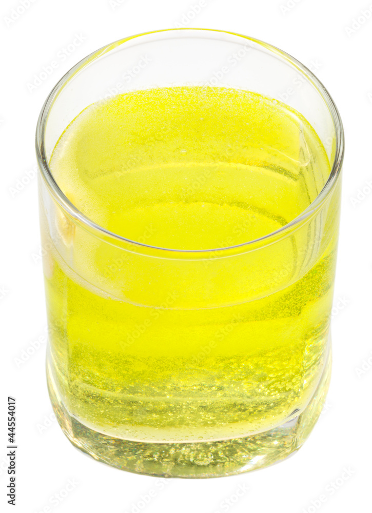 glass of yellow carbonated water with vitamin C glass of yellow carbonated water with vitamin C