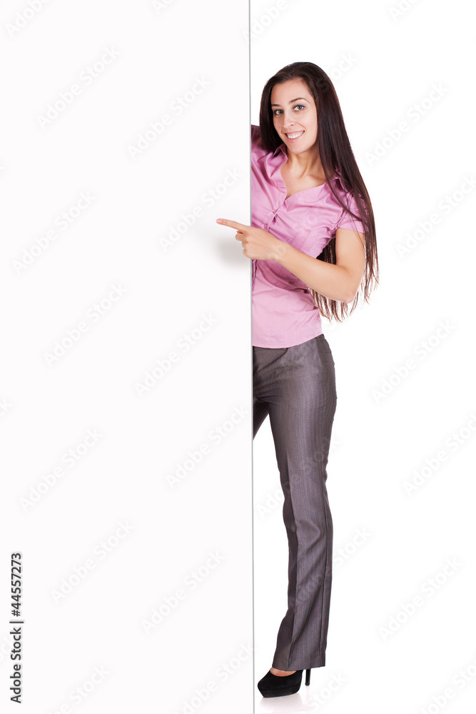 girl is points a finger at a white sheet girl is points a finger at a white sheet