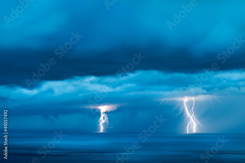 Storm over the sea with lightning #44557492