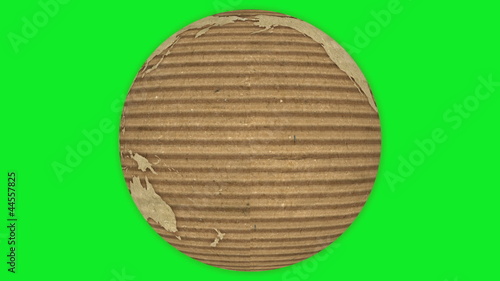 Corrugated Cardboard Earth rotating on green screen. Loopable.