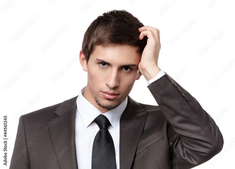 Scratching back of the head business man has some problems Scratching back of the head business man has some problems