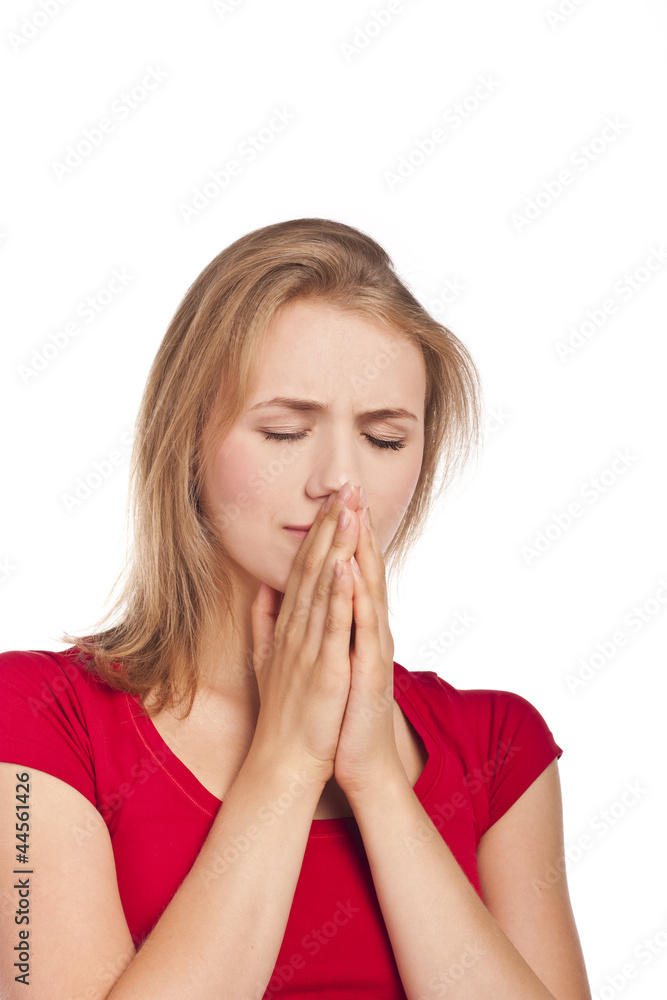 Attractive female student in red thinks. studio Attractive female student in red thinks. studio