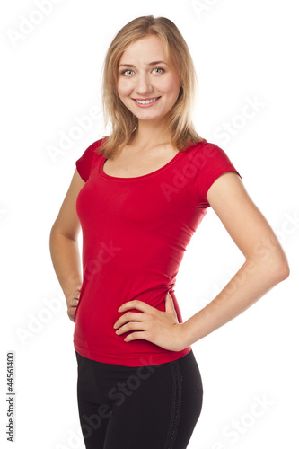 Attractive smiling blond in studio, white background