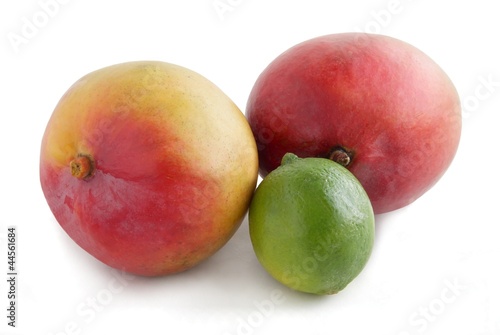 red mango fruits and green lime